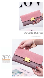 Detailed view of color-block frosted leather wallet with pink and purple panel textures