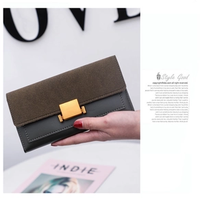Detailed view of bicolor long wallet with matte finish and elegant golden metal clasp