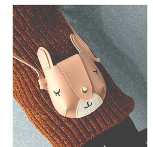 Toddler princess crossbody bag with cute rabbit ears and button closure worn on sweater