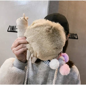 Cute beige alpaca plush crossbody bag with colorful pom-pom charms and braided rope strap