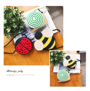 Detailed view of snail, bee and ladybird cartoon PU leather crossbody bags for kids