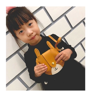 Girl's cute yellow rabbit shoulder bag with long ears and secure metal snap closure