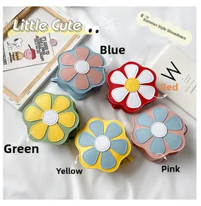 Detail shot of five colorful flower-shaped mini crossbody bags for girls in soft colors
