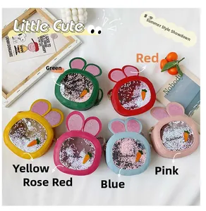 Flat lay of colorful sequined bunny bags in green, red, yellow, pink and blue colors