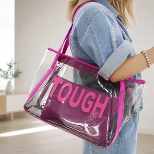 Transparente PVC-Tote-Bag mit lila Innentasche und TOUGH-Buchstabendruck für den Sommerstrand