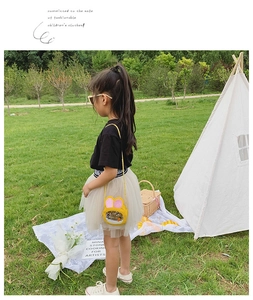 Kid's yellow bunny crossbody bag with sequin ears and liquid glitter window in garden