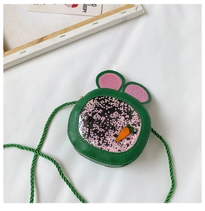 Detail of green rabbit ear crossbody bag with sequins and carrot patch for kids