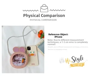 Pink rabbit ears bag next to an iPhone to show the compact size and sequins