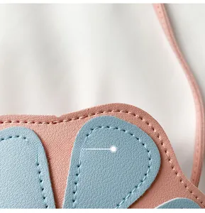 Detailed macro view of high-quality lychee textured leather petals and fine stitching
