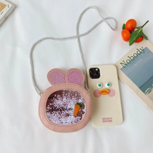 Pink rabbit ears crossbody bag with sequin carrot window and woven silver strap