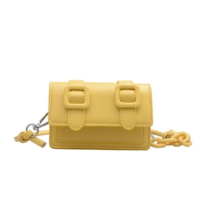 Mini bright yellow leather Cambridge bag with chunky chain strap and flap closure