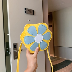 Cute yellow flower-shaped mini crossbody bag for girls with blue petals in PU leather