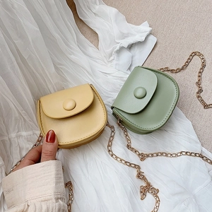 Chic girls' mini crossbody bags in yellow and green with gold chain straps