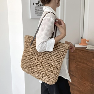 Large capacity woven straw tote bag with brown leather straps for summer beach vacation