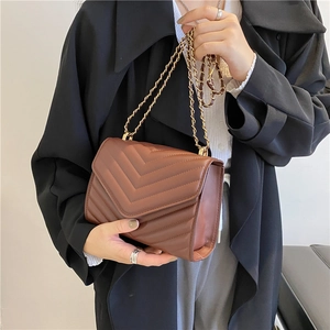 Brown V-quilted chain shoulder bag for women with golden metal strap detail