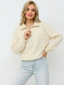 Women's cream half-zip sweatshirt with collar and ribbed cuffs on white background