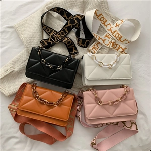 Chic quilted crossbody bags in four colors with chain handles and patterned wide straps