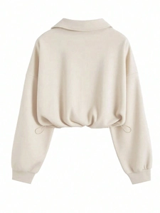Back view of beige lapel cropped sweatshirt with drop shoulder lantern sleeves and drawstring