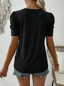 Women's black short sleeve T-shirt with hollow lace puff sleeves and crew neck back view