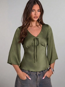 Olive green satin V-neck blouse with bow tie detail and flared sleeves for women