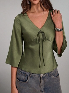 Women's V-neck dark green satin blouse with bow tie and flare sleeves for spring fashion