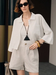Women's white cotton short sleeve shirt and striped high-waisted shorts set