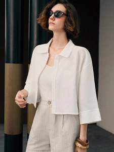 Minimalist white cotton short shirt with wide sleeves and lapel collar for women