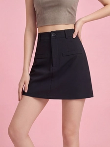 Detailed front view of black high-waisted A-line mini skirt with decorative button and flaps