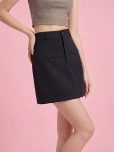 Detailed side view of high-waist black A-line skirt with button and pocket detail