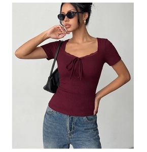 Detail of burgundy lace square-neck slim fit t-shirt with ribbon lace-up decoration
