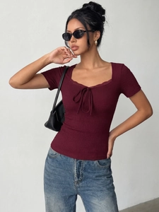 Close-up of wine red slim top showing square lace neckline and tie-up drawstring detail