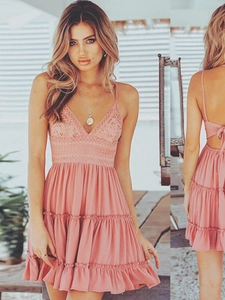 Pink backless lace slip dress with tiered A-line skirt for summer vacations