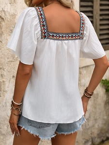 Detailed embroidery and ruffle sleeve on a white square neck summer top for women