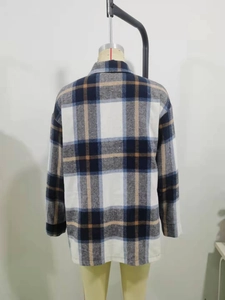 Detail showing back view of blue and white plaid long sleeve shirt jacket for women