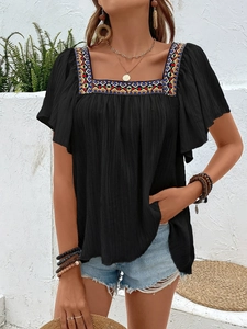 Women's black boho square neck blouse with colorful floral embroidery and ruffle sleeves