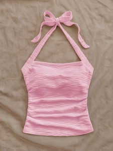 Pink halter top with textured ripple fabric and neck tie for 2025 summer beach vacation
