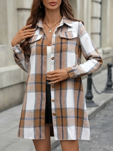 Detailed view of women's plaid long-sleeve shacket featuring front pockets and resin buttons