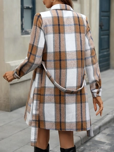 Detail of a plaid long-sleeve dress with back view of checkered pattern and waist belt