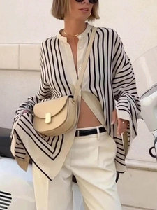 Women's oversized black and white striped long sleeve shirt with a loose button-down fit