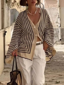 Women's chic beige and black striped long sleeve buttoned cardigan in a French style