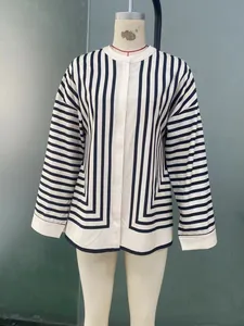 Detail of classic striped shirt showing the geometric pattern and sharp stand collar