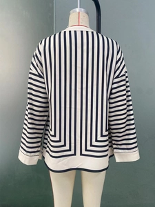Women's long sleeve black and white striped blouse with geometric patterns and silk finish