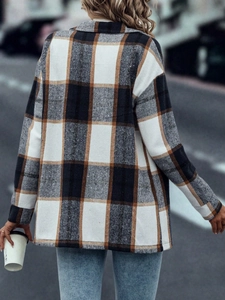 Detailed back view of checkered oversized shacket with drop shoulder in street style