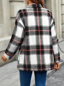 Back view of oversized black and red plaid shacket featuring drop shoulder design
