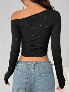Slim fit black off-shoulder long sleeve top with shimmering rhinestones and ribbed texture
