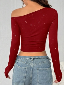 Back view of slim fit burgundy ribbed knit crop top with shimmering silver rhinestones