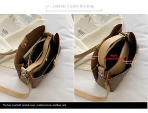 Detailed interior of the brown leather shoulder bag showing the multi-layer storage compartments