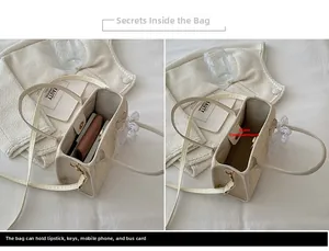 Détail du sac bandoulière en paille avec nœud en dentelle montrant le volume intérieur