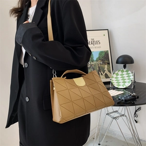 Chic khaki quilted shoulder bag with geometric stitching and modern bucket style design