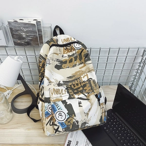 Detail view of stylish graffiti pattern and durable texture on the cream backpack
